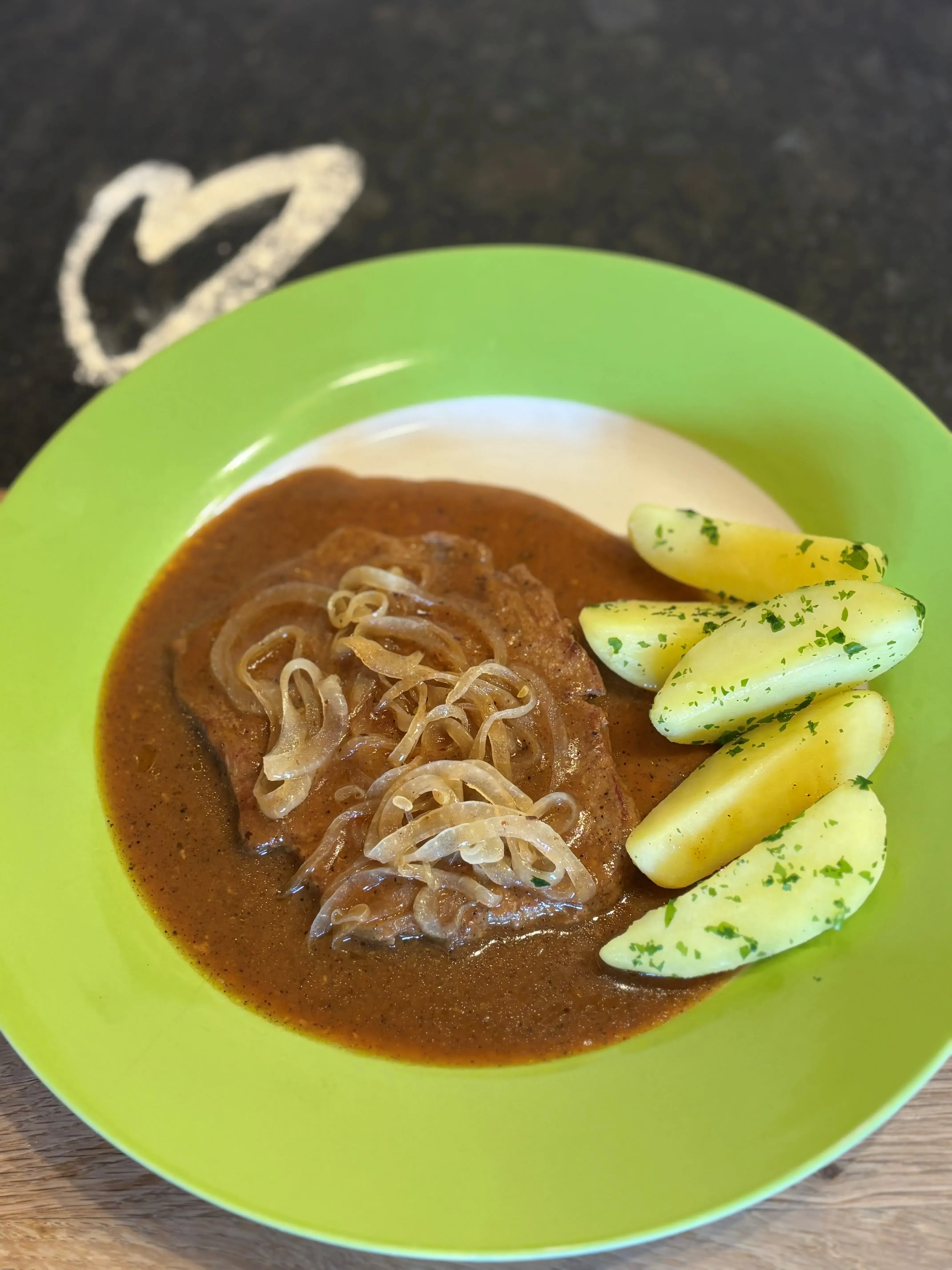 Rindsschnitzel Zwiebelrostbraten